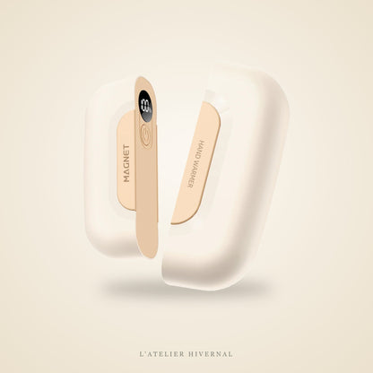 Chauffe-mains magnétique beige sur fond crème